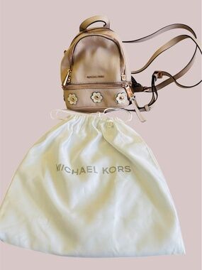 Michael Kors Mini Rhea Blush Pink Leather Mini Backpack with Floral Accents